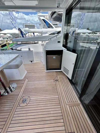  Yacht Photos Pics 2023 Azimut Fly 60 yacht deck with sleek design and modern amenities.