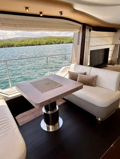  Yacht Photos Pics Luxurious interior of 2023 Azimut Fly 60 yacht with scenic water view.