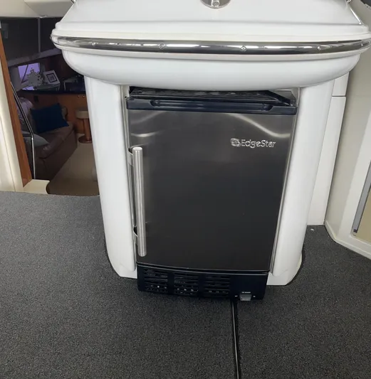 Ware II Go Yacht Photos Pics EdgeStar fridge on 2002 Carver 466 Motor Yacht interior.