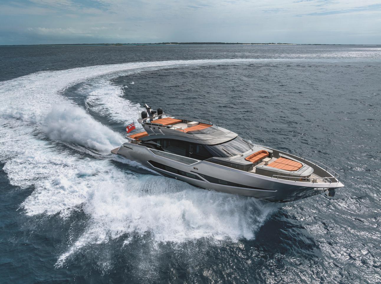 Luxurious 2025 AB 80 yacht cruising swiftly on open ocean waters.