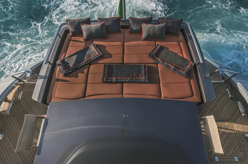  Yacht Photos Pics Luxurious AB 80 yacht deck with cushions, cruising through ocean waves, 2025 model.