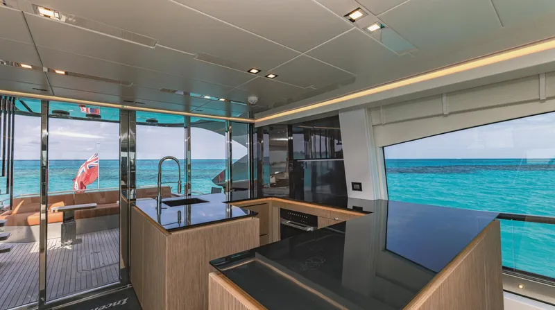  Yacht Photos Pics Luxurious yacht interior with modern kitchen, ocean view, and sleek design. AB 80, 2025 model.