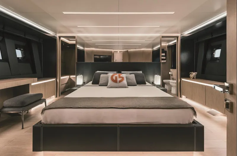  Yacht Photos Pics Luxurious bedroom interior of 2025 AB 80 yacht, featuring modern design and ambient lighting.
