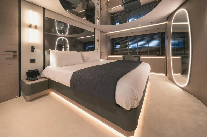  Yacht Photos Pics Luxurious modern bedroom interior in AB 80 yacht, 2025 model, featuring elegant lighting and sleek design.