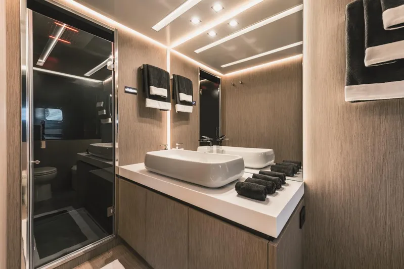  Yacht Photos Pics Luxurious modern bathroom in AB 80 yacht, 2025 model, featuring sleek design and ambient lighting.
