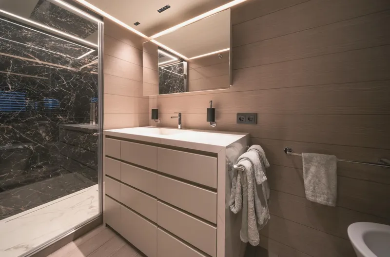  Yacht Photos Pics Modern bathroom with sleek vanity, marble shower, and ambient lighting, AB 80, 2025 model.