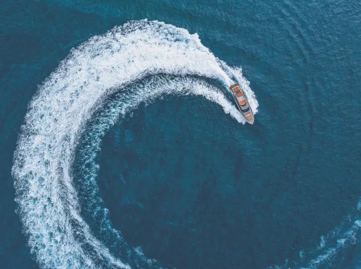  Yacht Photos Pics Aerial view of AB 80 boat making a circular wave pattern in the ocean, 2025 model.