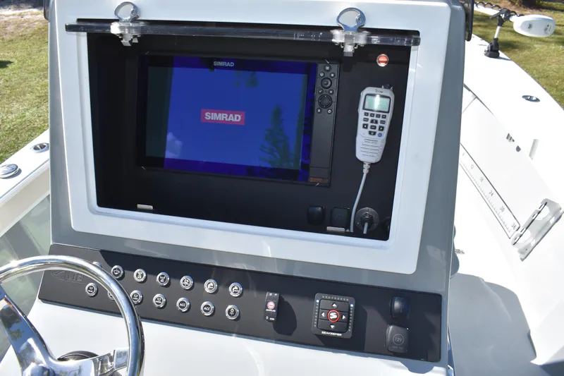  Yacht Photos Pics Control panel of 2025 Latitude Tournament Boats 25 with Simrad display and radio.