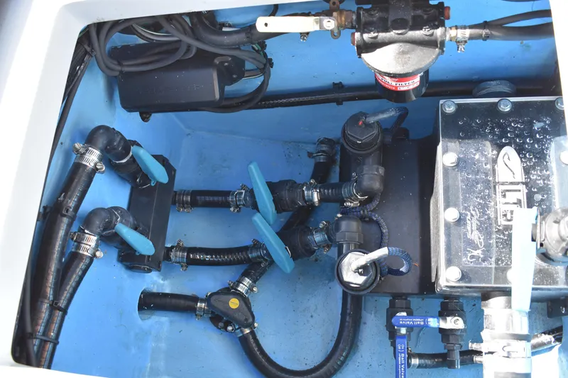  Yacht Photos Pics Engine compartment of 2025 Latitude Tournament Boats 25, showcasing valves and hoses.
