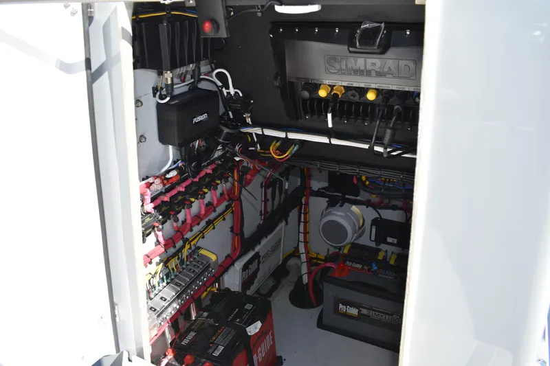  Yacht Photos Pics Electrical system inside 2025 Latitude Tournament Boats 25, featuring Simrad and Fusion equipment.