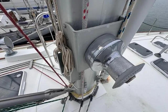 Must Love Dogs Yacht Photos Pics Deck view of a 1996 Beneteau 50 sailboat, featuring mast and rigging details.