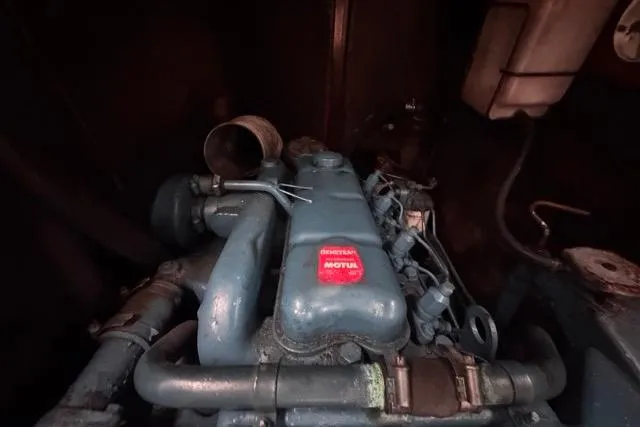 Must Love Dogs Yacht Photos Pics Engine of a 1996 Beneteau 50 sailboat, featuring a Motul-branded component.