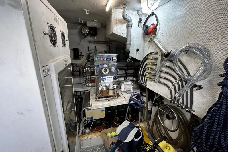  Yacht Photos Pics Engine room of 2002 Sanlorenzo SL72 yacht with machinery and equipment.