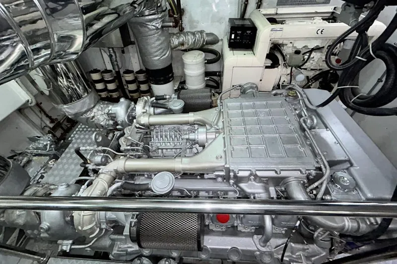  Yacht Photos Pics Engine room of a 2002 Sanlorenzo SL72 yacht, showcasing intricate machinery and components.