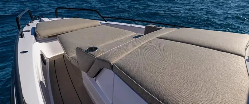  Yacht Photos Pics 2024 Axopar 37 Sun Top boat with spacious sunbathing area on open water.