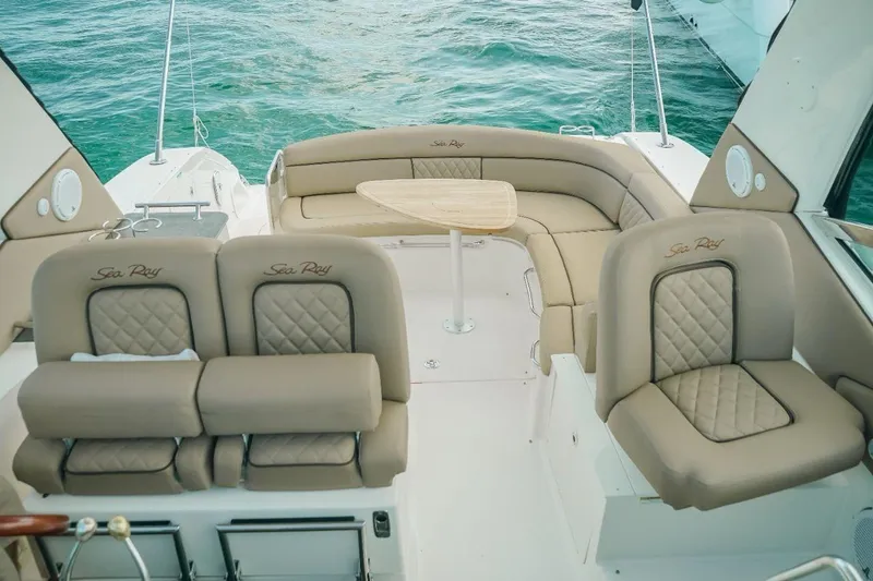 2012 Sea Ray 370 Da @ Cancun Sogu Yacht Photos Pics Luxurious 2012 Sea Ray 370 Sundancer boat interior with beige seating and ocean view.