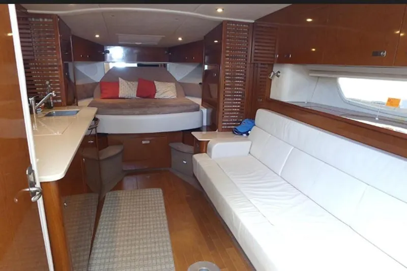 2012 Sea Ray 370 Da @ Cancun Sogu Yacht Photos Pics Luxurious interior of 2012 Sea Ray 370 Sundancer yacht with cozy seating and elegant design.