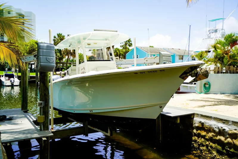  Yacht Photos Pics 2016 Sea Hunt Gamefish 30 boat docked in a sunny marina setting.