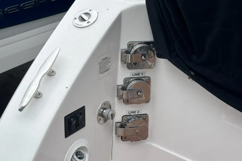  Yacht Photos Pics 2019 Regal 33 XO boat deck with cleat and line holders.