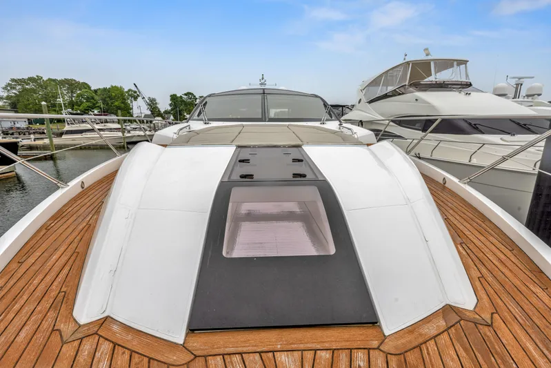 Diggin It Yacht Photos Pics 2015 Sunseeker Predator 68 yacht with teak deck and skylight.