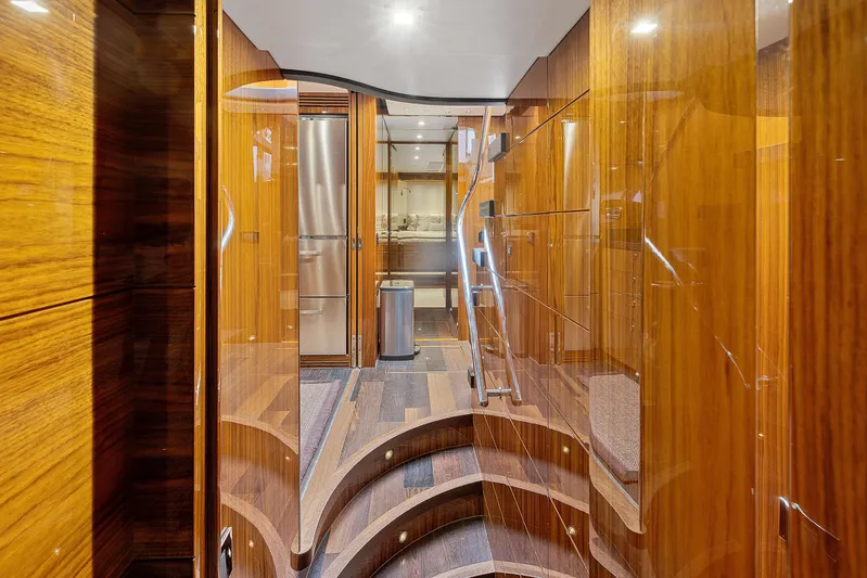 Diggin It Yacht Photos Pics Luxurious interior of 2015 Sunseeker Predator 68 yacht with polished wood finish.