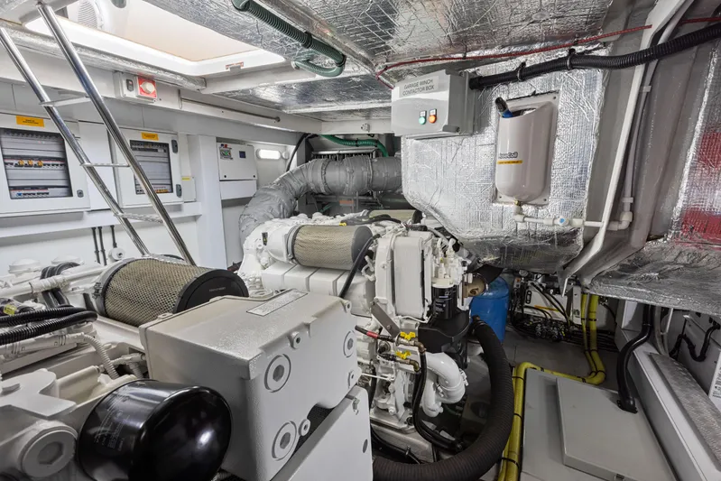 Diggin It Yacht Photos Pics Engine room of a 2015 Sunseeker Predator 68 yacht with advanced machinery.