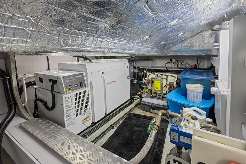 Diggin It Yacht Photos Pics Engine room of a 2015 Sunseeker Predator 68 yacht with generator and equipment.