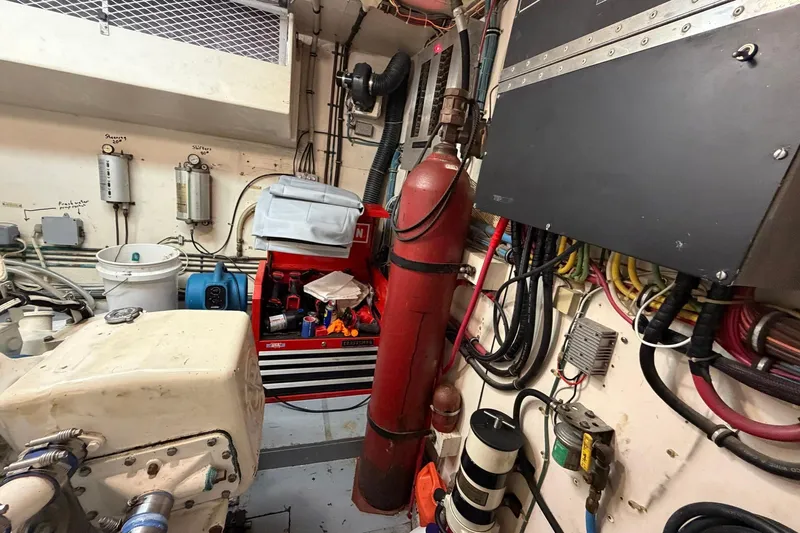 Lady Rae Yacht Photos Pics Engine room of 1987 Hatteras 58 Motor Yacht with tools and equipment.