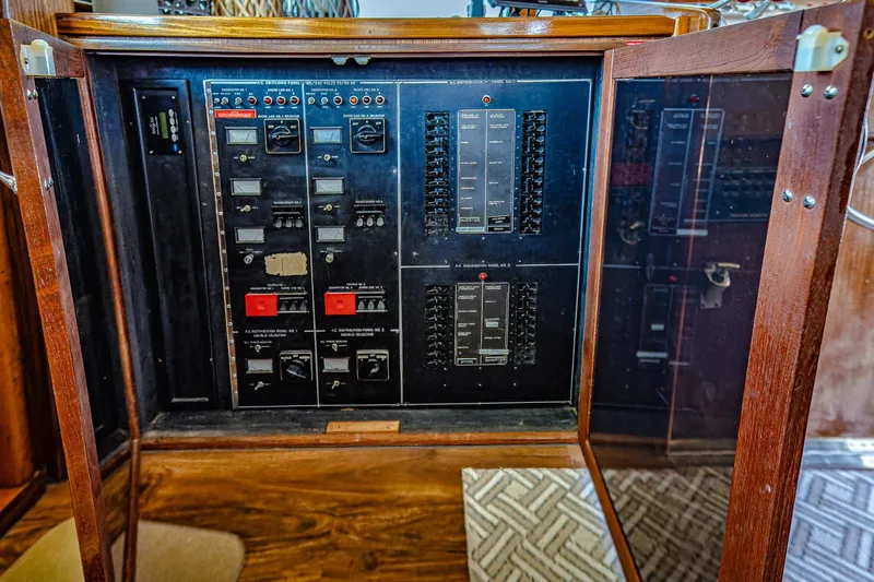 Lady Rae Yacht Photos Pics Electrical panel inside a 1987 Hatteras 58 Motor Yacht, featuring switches and controls.