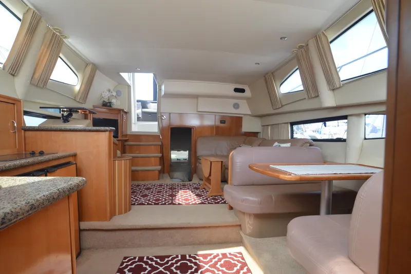 The Loon Yacht Photos Pics Luxurious interior of 2004 Carver 366 Motoryacht with elegant seating and modern amenities.