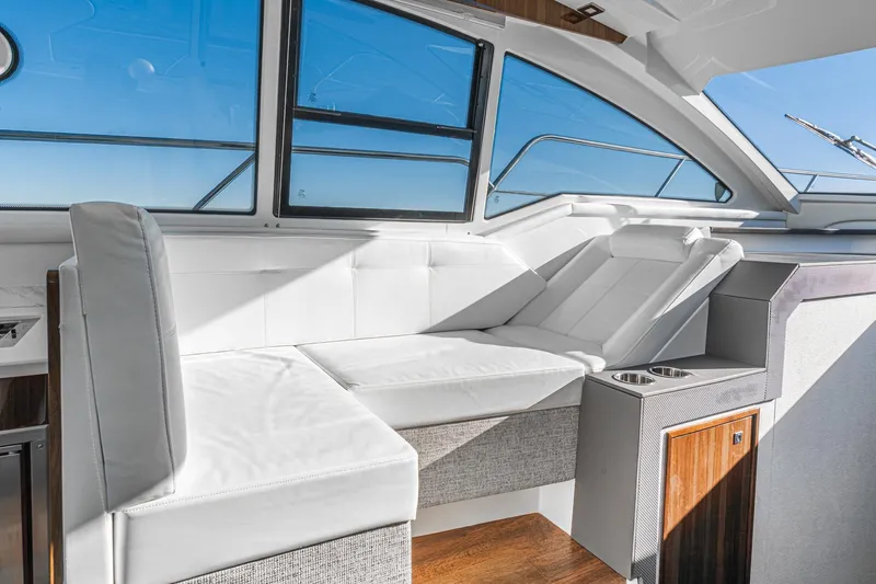 Lagniappe Yacht Photos Pics Luxurious interior seating of 2023 Cruisers Yachts 42 Cantius with modern design and comfort.