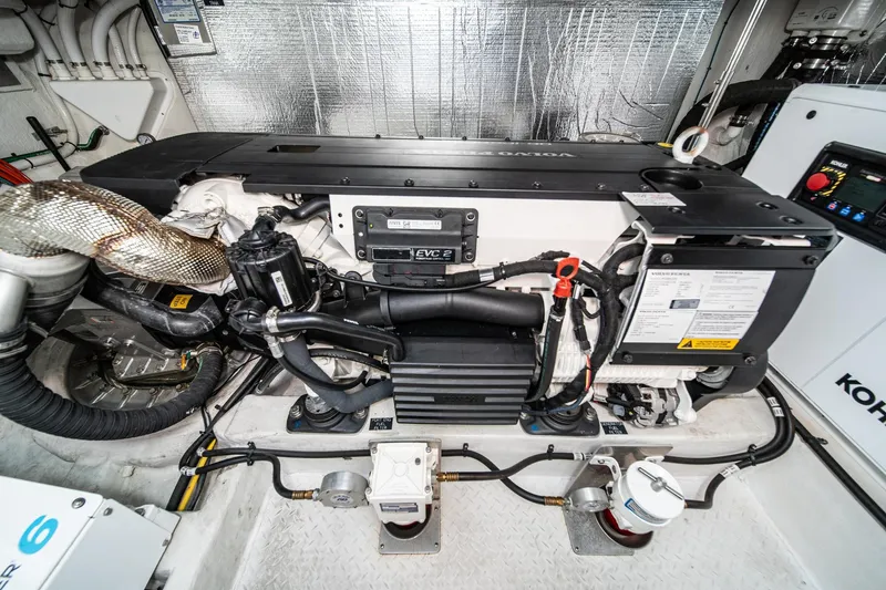 Lagniappe Yacht Photos Pics Engine room of 2023 Cruisers Yachts 42 Cantius, featuring Volvo Penta engine components.