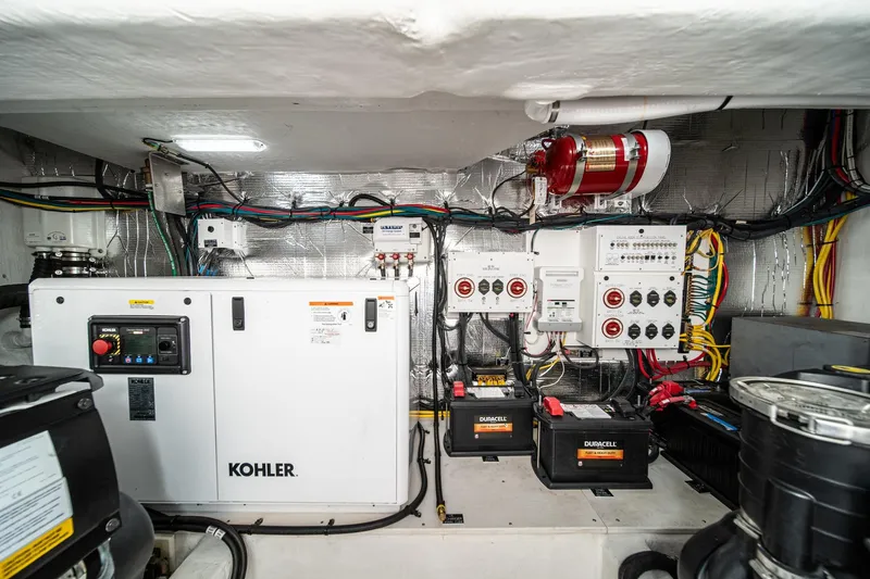 Lagniappe Yacht Photos Pics Engine room of 2023 Cruisers Yachts 42 Cantius with Kohler generator and electrical systems.