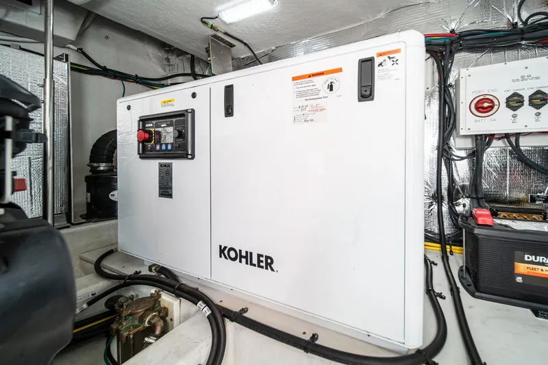 Lagniappe Yacht Photos Pics Engine room of 2023 Cruisers Yachts 42 Cantius with Kohler generator.