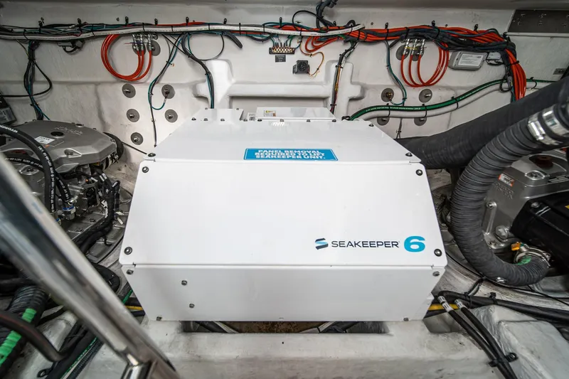 Lagniappe Yacht Photos Pics Engine room of 2023 Cruisers Yachts 42 Cantius with Seakeeper 6 stabilizer.