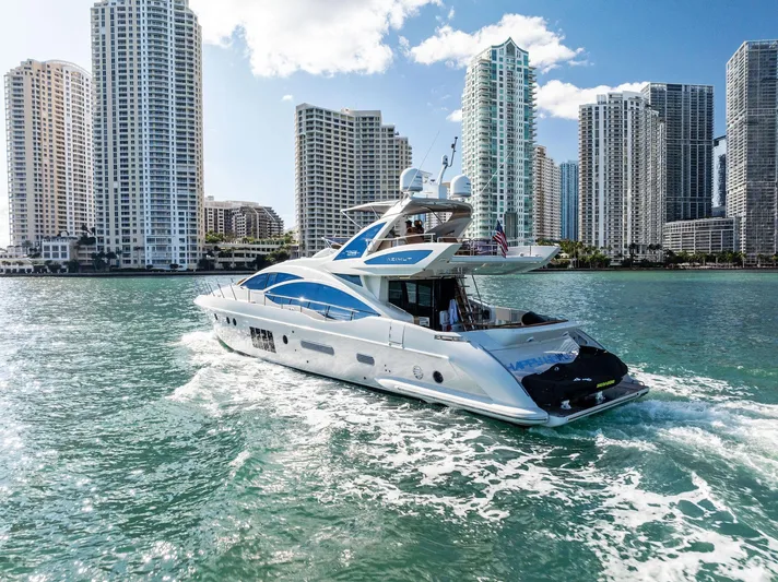  Yacht Photos Pics Luxurious 2014 Azimut 72S yacht cruising near city skyline.