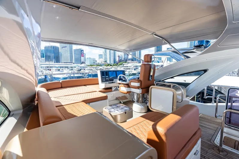  Yacht Photos Pics Luxurious 2014 Azimut 72S yacht interior with city skyline view.