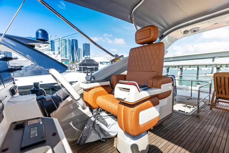  Yacht Photos Pics Luxurious 2014 Azimut 72S yacht helm with leather seating and modern controls.