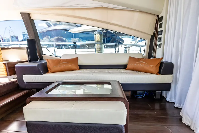  Yacht Photos Pics Luxurious interior of 2014 Azimut 72S yacht with elegant seating and glass table.