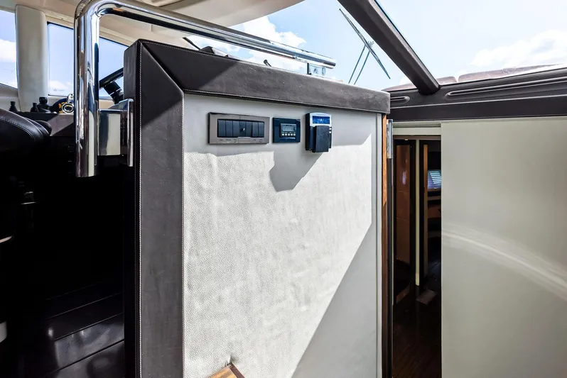  Yacht Photos Pics Interior view of 2014 Azimut 72S yacht, featuring control panel and modern design elements.