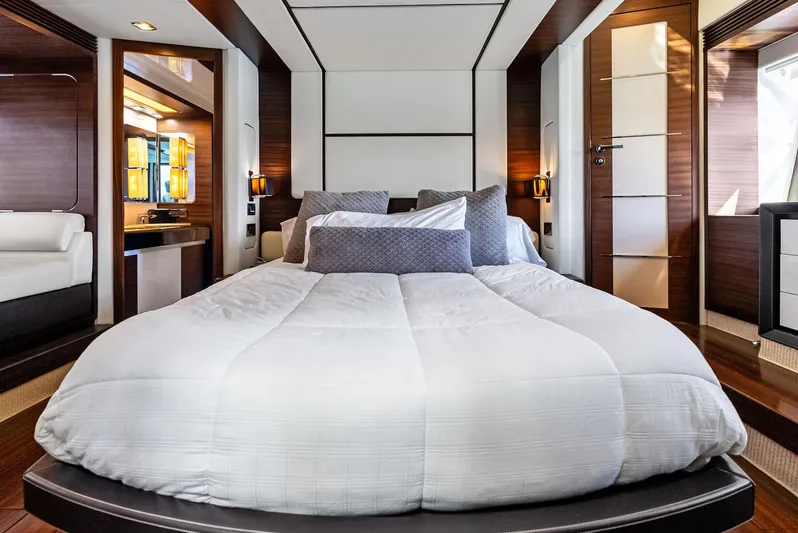  Yacht Photos Pics Luxurious bedroom interior of 2014 Azimut 72S yacht with modern design and cozy bedding.