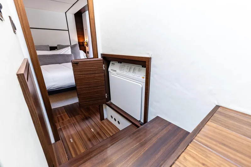  Yacht Photos Pics Interior of 2014 Azimut 72S yacht featuring a compact laundry area.