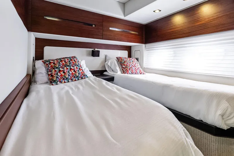  Yacht Photos Pics Luxurious twin cabin in 2014 Azimut 72S yacht with modern decor and colorful pillows.