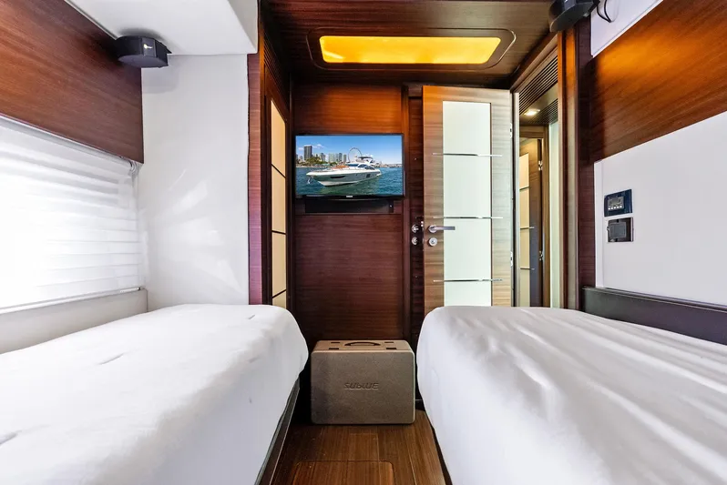  Yacht Photos Pics Luxurious 2014 Azimut 72S yacht cabin with twin beds and modern decor.