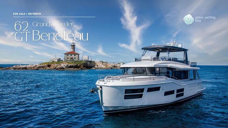 Gran Firin Yacht Photos Pics 2024 Beneteau Grand Trawler 62 yacht cruising near a lighthouse under a clear blue sky.