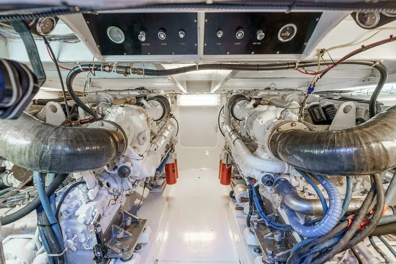 Shotgun Yacht Photos Pics Engine room of 1981 Merritt 55 c boat with dual engines and control panel.