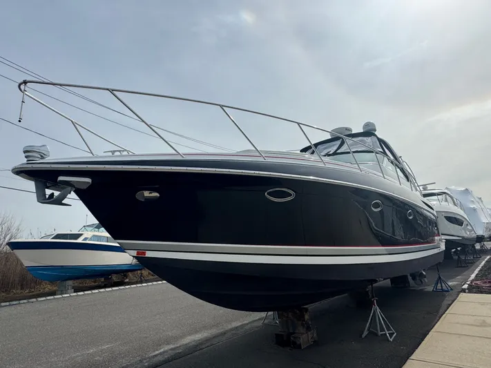 Anything For Me Too Yacht Photos Pics 2014 Formula 37 Performance Cruiser docked outdoors.