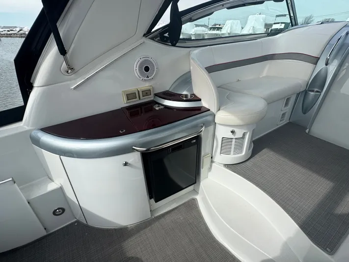 Anything For Me Too Yacht Photos Pics Interior of 2014 Formula 37 Performance Cruiser with seating and minibar.