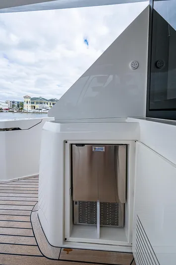 Time Chaser Yacht Photos Pics 2021 Ferretti Yachts 500 deck with built-in stainless steel appliance.