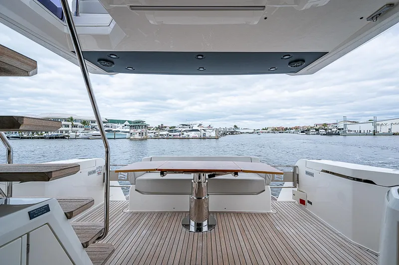 Time Chaser Yacht Photos Pics Ferretti Yachts 500, 2021 model, featuring a spacious deck with marina view.